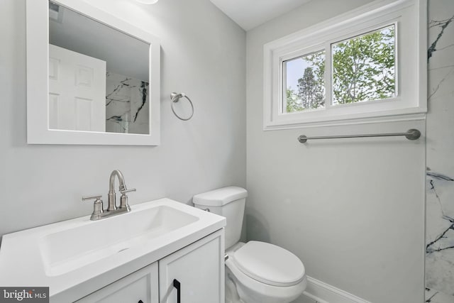 505 N Naylor St, Alexandria, VA 22304 - bathroom featuring toilet, vanity, and a marble finish shower