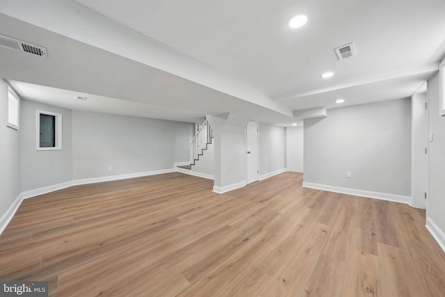 505 N Naylor St, Alexandria, VA 22304 - finished below grade area with baseboards, recessed lighting, stairway, and light wood-style flooring