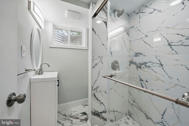 505 N Naylor St, Alexandria, VA 22304 - bathroom featuring marble look tile flooring, a marble finish shower, and vanity