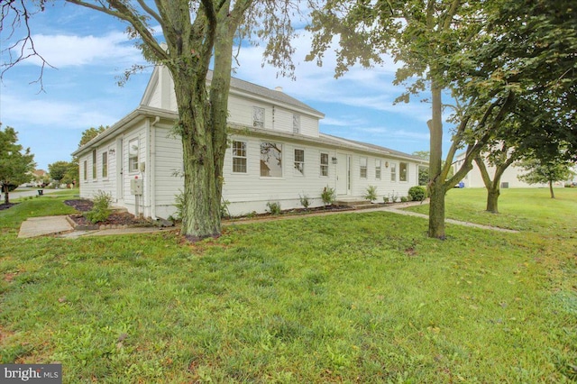 exterior space with a yard