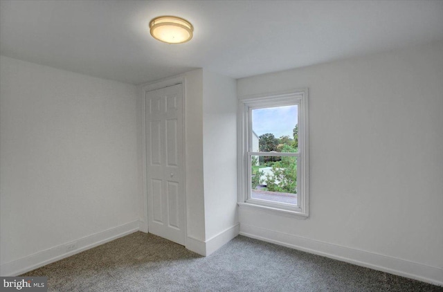 interior space featuring baseboards