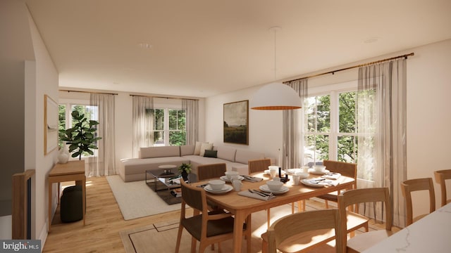 dining space with light wood-style floors