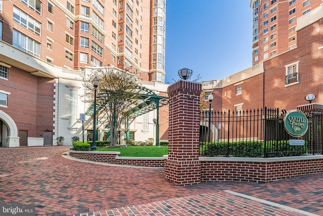 view of property's community with fence