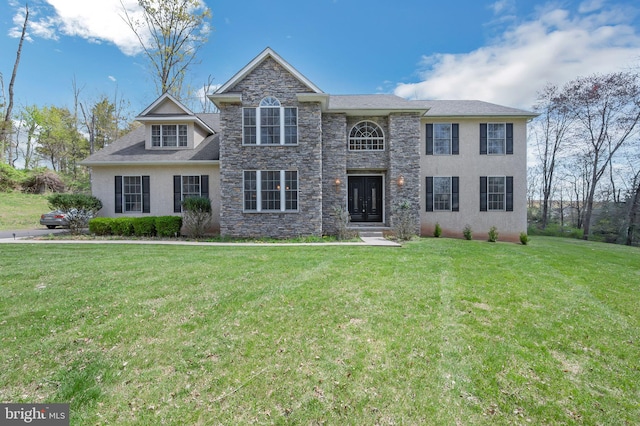 traditional home with stucco siding, stone siding, and a front yard