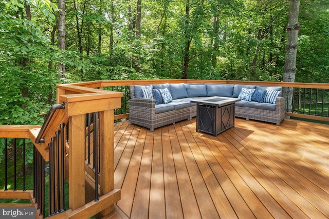 7625 Holbrook Ct, Manassas, VA 20112 - wooden deck featuring outdoor lounge area and a wooded view
