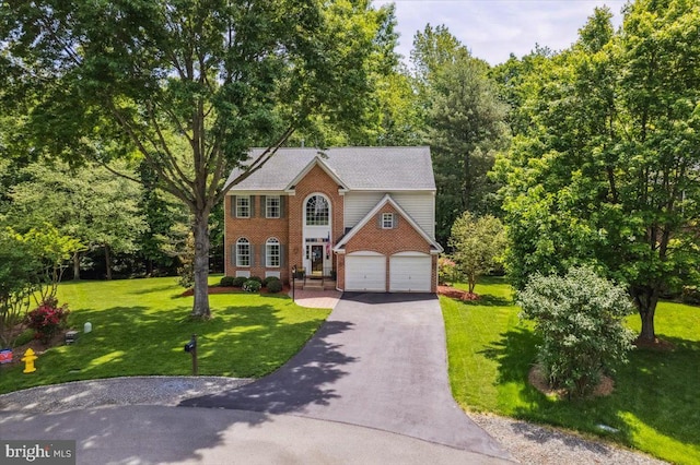 7625 Holbrook Ct, Manassas, VA 20112 - colonial inspired home featuring driveway, brick siding, a front yard, and an attached garage