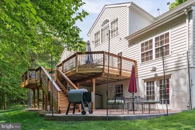 7625 Holbrook Ct, Manassas, VA 20112 - rear view of property featuring a patio area, a deck, and a lawn