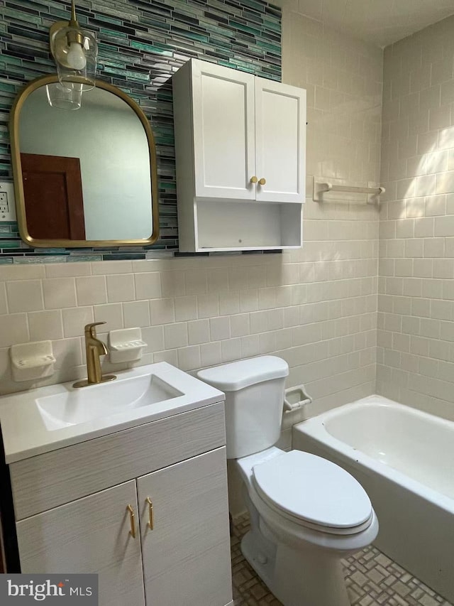 full bathroom featuring decorative backsplash, toilet, tile walls, and vanity