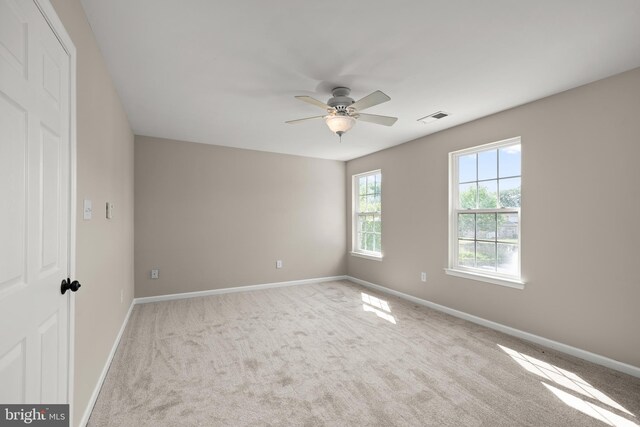 10023 Iron Pointe Drive Ext Unit 201B2, Millsboro, DE 19966 - carpeted spare room featuring a ceiling fan and baseboards