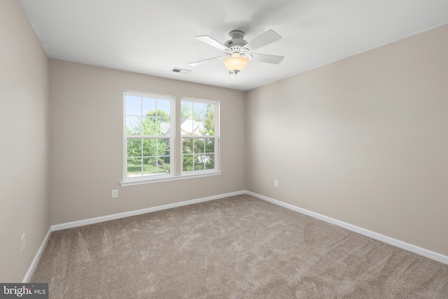 10023 Iron Pointe Drive Ext Unit 201B2, Millsboro, DE 19966 - carpeted spare room featuring baseboards and a ceiling fan