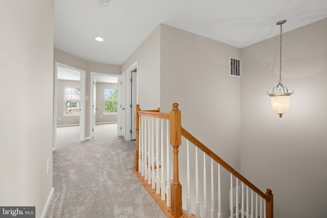 10023 Iron Pointe Drive Ext Unit 201B2, Millsboro, DE 19966 - corridor featuring an upstairs landing, light colored carpet, baseboards, and recessed lighting