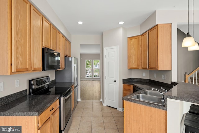 10023 Iron Pointe Drive Ext Unit 201B2, Millsboro, DE 19966 - kitchen featuring black microwave, electric stove, a sink, a peninsula, and light tile patterned floors