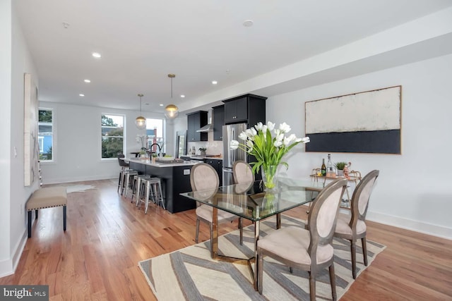 426 Manor Pl NW Unit 3, Washington, DC 20010 - dining space with light wood-type flooring, recessed lighting, and baseboards