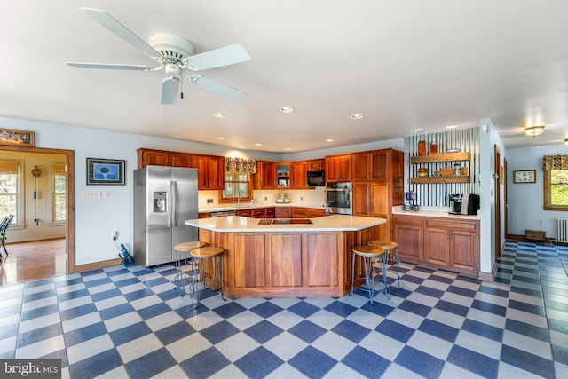1460 Pitcock Ln, Winchester, VA 22602 - kitchen featuring tile patterned floors, light countertops, and stainless steel appliances