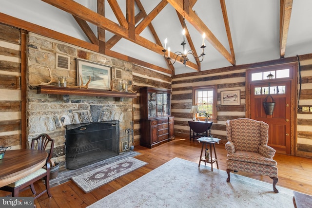 1460 Pitcock Ln, Winchester, VA 22602 - living room with visible vents, high vaulted ceiling, beam ceiling, and hardwood / wood-style floors