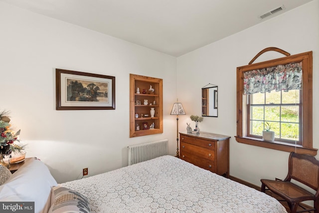 1460 Pitcock Ln, Winchester, VA 22602 - bedroom with radiator heating unit, baseboards, and visible vents