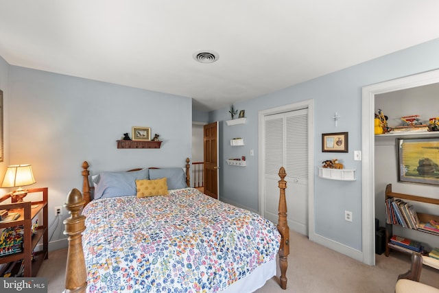 1460 Pitcock Ln, Winchester, VA 22602 - carpeted bedroom with visible vents, a closet, and baseboards