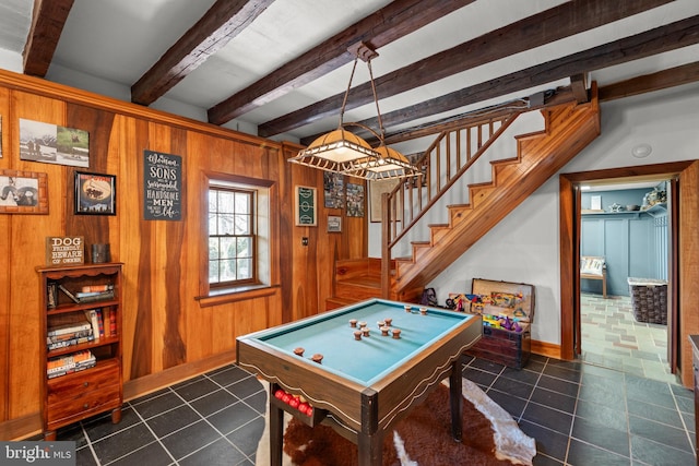 1460 Pitcock Ln, Winchester, VA 22602 - playroom featuring beamed ceiling, wooden walls, baseboards, and dark tile patterned floors