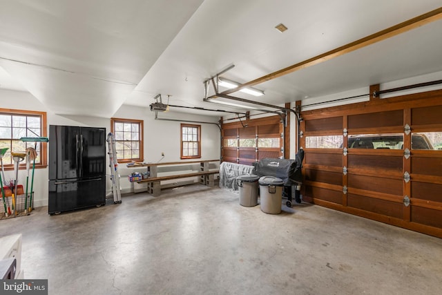 1460 Pitcock Ln, Winchester, VA 22602 - garage with freestanding refrigerator and a garage door opener