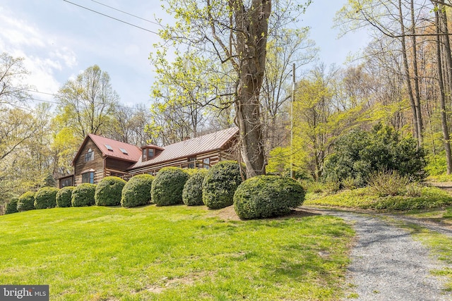 1460 Pitcock Ln, Winchester, VA 22602 - view of property exterior with a yard and metal roof