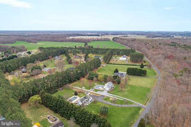 birds eye view of property with a rural view