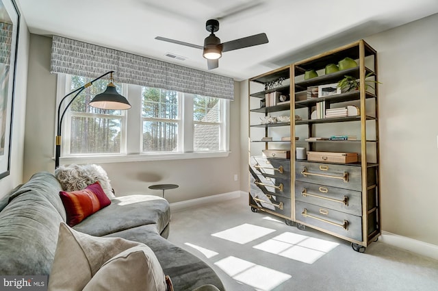 751 Bowie Shop Rd, Huntingtown, MD 20639 - living area featuring visible vents, carpet flooring, baseboards, and a ceiling fan