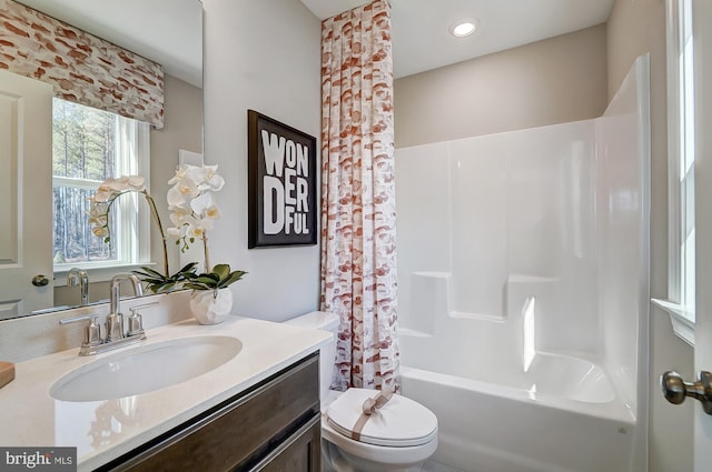 751 Bowie Shop Rd, Huntingtown, MD 20639 - bathroom featuring recessed lighting, toilet, vanity, and shower / bathtub combination with curtain