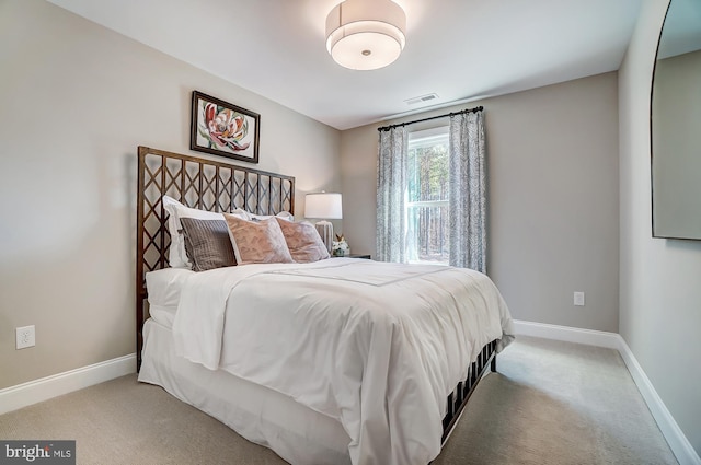 751 Bowie Shop Rd, Huntingtown, MD 20639 - bedroom with visible vents, light colored carpet, and baseboards