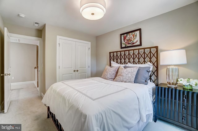 751 Bowie Shop Rd, Huntingtown, MD 20639 - bedroom featuring light colored carpet, a closet, and baseboards