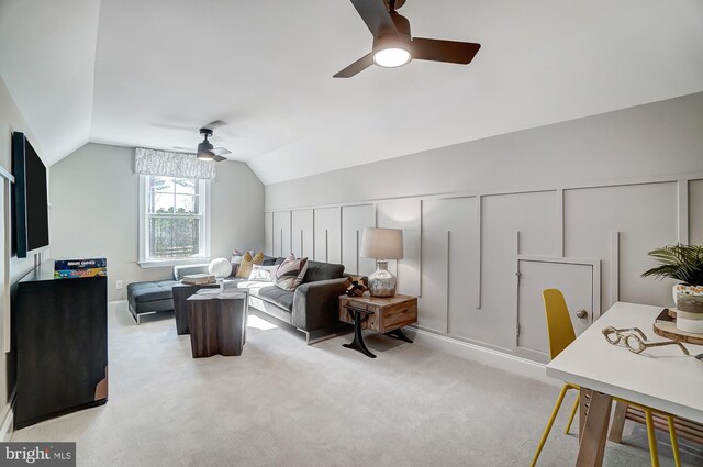 751 Bowie Shop Rd, Huntingtown, MD 20639 - living room featuring carpet flooring, a decorative wall, ceiling fan, and vaulted ceiling