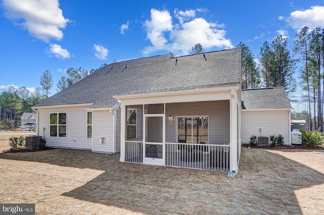 751 Bowie Shop Rd, Huntingtown, MD 20639 - rear view of property with roof with shingles, central AC unit, and a sunroom
