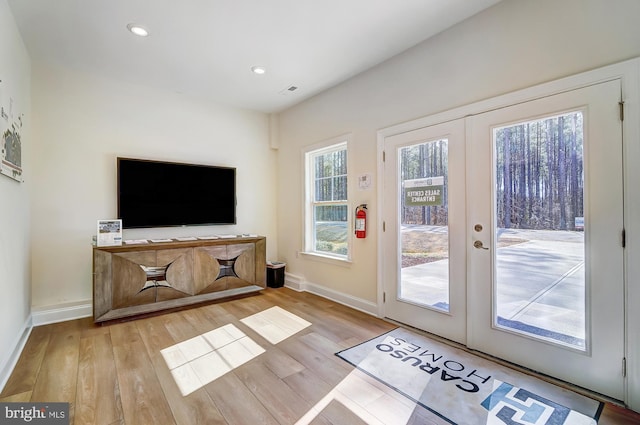 751 Bowie Shop Rd, Huntingtown, MD 20639 - doorway with recessed lighting, french doors, baseboards, and light wood finished floors