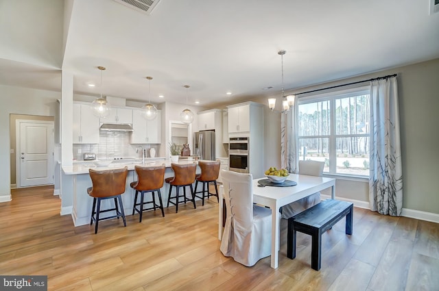 751 Bowie Shop Rd, Huntingtown, MD 20639 - dining space with visible vents, baseboards, recessed lighting, light wood-style flooring, and an inviting chandelier