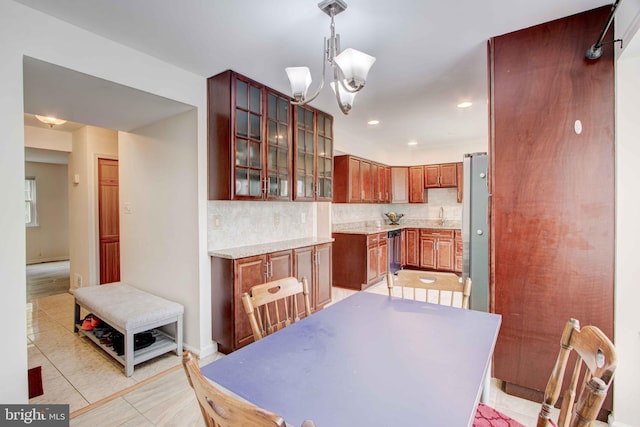 14613 Tynewick Ter Unit 6-1461, Silver Spring, MD 20906 - dining space featuring light tile patterned floors, a chandelier, baseboards, and recessed lighting
