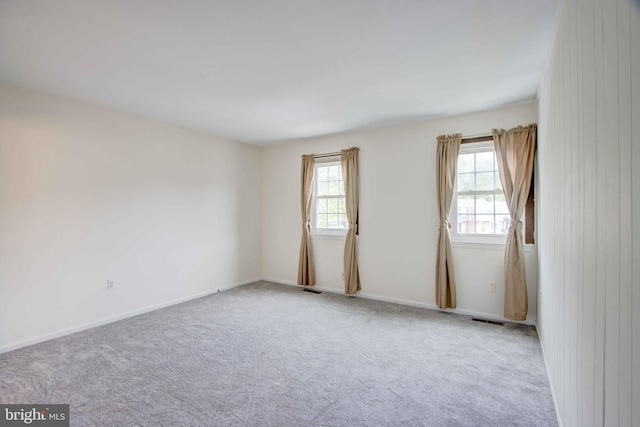 14613 Tynewick Ter Unit 6-1461, Silver Spring, MD 20906 - carpeted spare room with baseboards, a healthy amount of sunlight, and visible vents