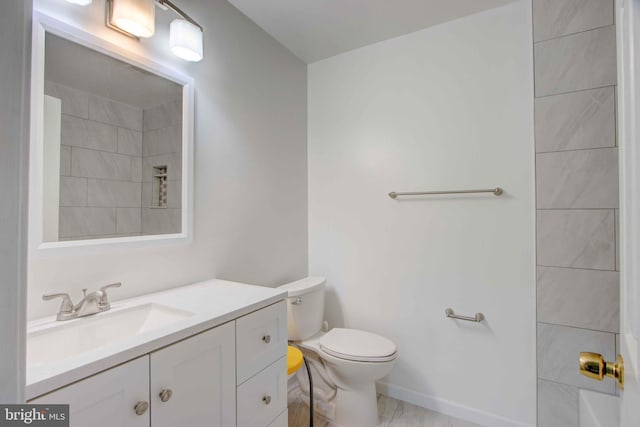 14613 Tynewick Ter Unit 6-1461, Silver Spring, MD 20906 - bathroom featuring toilet, marble finish floor, and vanity