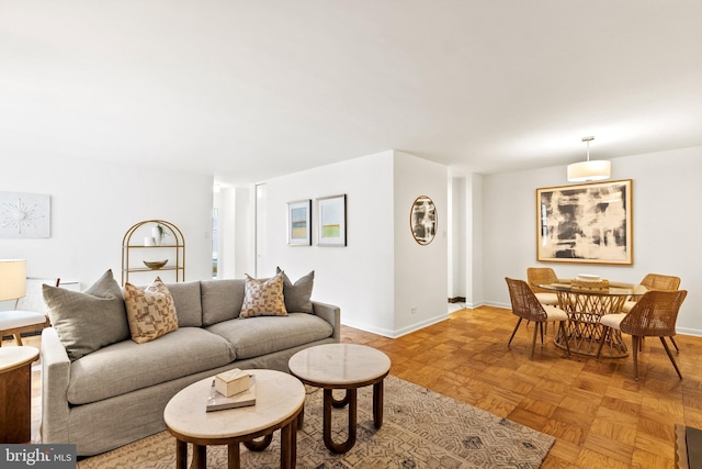 1260 21st St NW Unit 911, Washington, DC 20036 - living area featuring baseboards