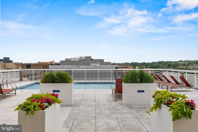 1260 21st St NW Unit 911, Washington, DC 20036 - community pool featuring a patio area