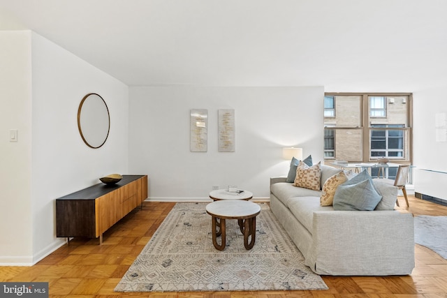 1260 21st St NW Unit 911, Washington, DC 20036 - living area featuring baseboards