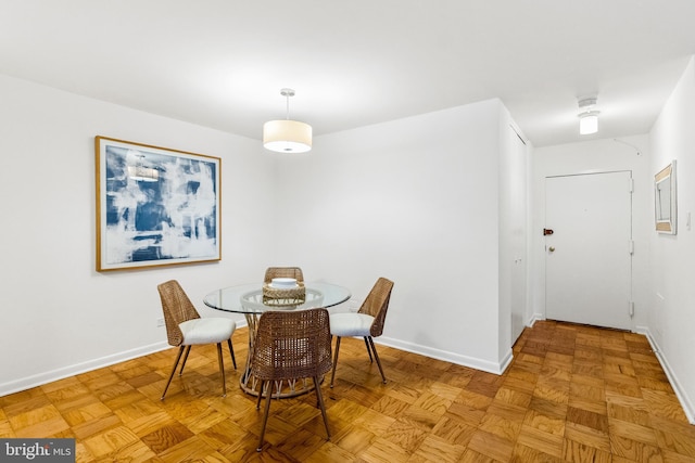 1260 21st St NW Unit 911, Washington, DC 20036 - dining room featuring baseboards