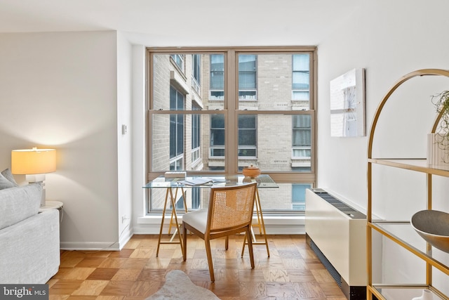 1260 21st St NW Unit 911, Washington, DC 20036 - dining room with radiator and baseboards