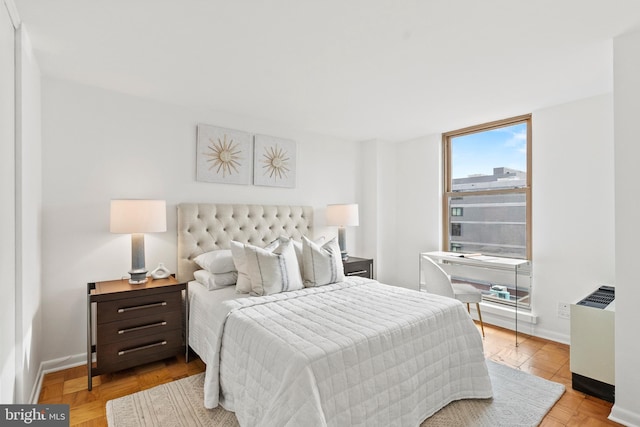 1260 21st St NW Unit 911, Washington, DC 20036 - bedroom featuring baseboards