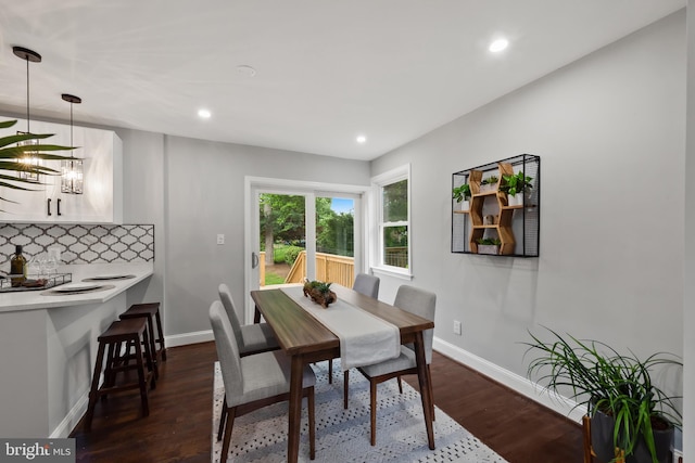 6611 Loch Hill Rd, Baltimore, MD 21239 - dining space featuring dark wood-type flooring and recessed lighting