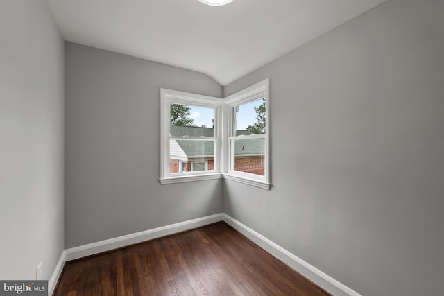 6611 Loch Hill Rd, Baltimore, MD 21239 - spare room with baseboards and dark wood-type flooring