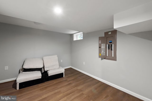 6611 Loch Hill Rd, Baltimore, MD 21239 - living area with electric panel and wood finished floors