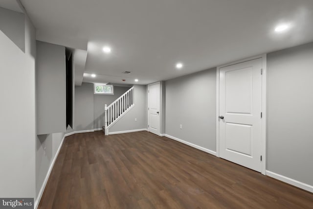 6611 Loch Hill Rd, Baltimore, MD 21239 - basement featuring wood finished floors, recessed lighting, and stairway