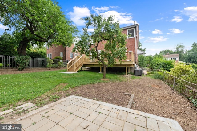 6611 Loch Hill Rd, Baltimore, MD 21239 - fenced backyard with stairs, a wooden deck, and a patio area