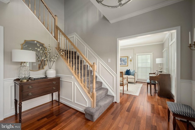 47 Christopher Way, Stafford, VA 22554 - staircase with hardwood / wood-style flooring, ornamental molding, and a wainscoted wall