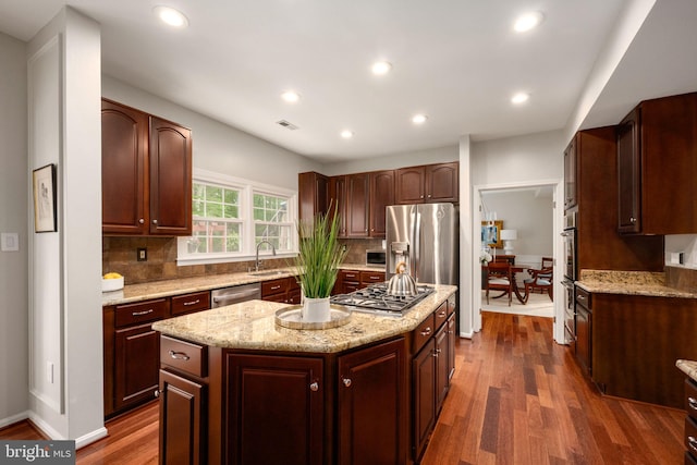 47 Christopher Way, Stafford, VA 22554 - kitchen featuring a kitchen island, tasteful backsplash, dark wood finished floors, recessed lighting, and appliances with stainless steel finishes