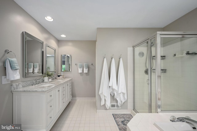 47 Christopher Way, Stafford, VA 22554 - full bath with a shower stall, tile patterned flooring, double vanity, baseboards, and recessed lighting